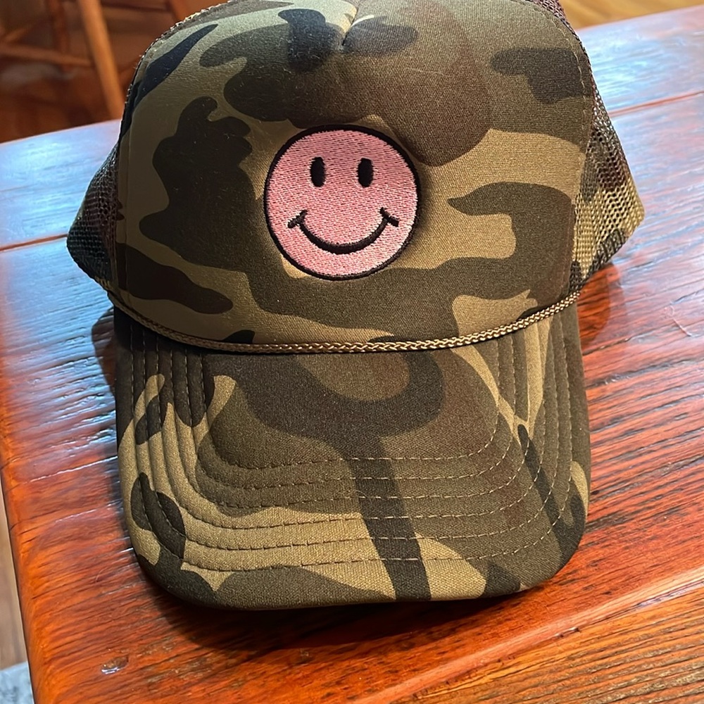 Camo trucker hat with smiley face